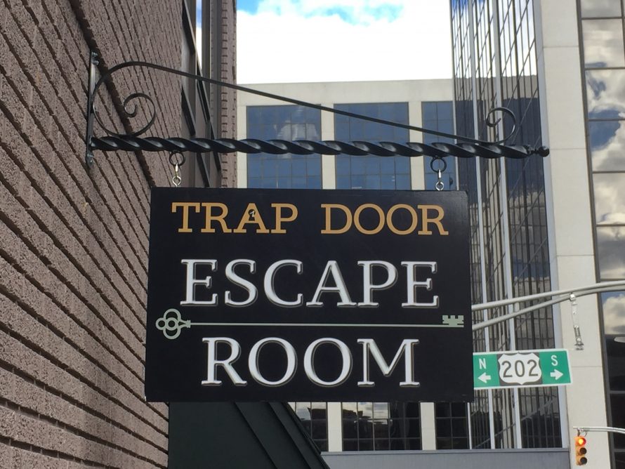 Trap Door Escape Room Hanging Sign